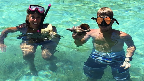 finding helmet conch, sand dollars sea glass and shells in Eleuthera